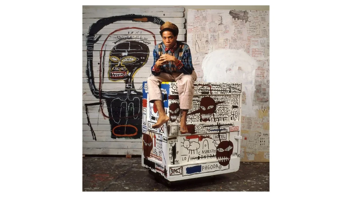 Jean-Michel Basquiat 1985 © Lizzie Himmel. Artwork © Estate of Jean-Michel Basquiat. Licensed by Artestar, New York.